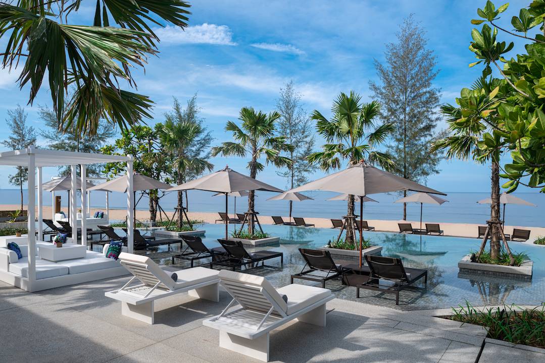 Beachfront pool of the resort at dusk